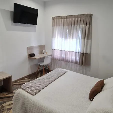 óleo Auto Check-in Pensión 3*